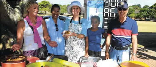  ?? Picture: JON HOUZET ?? DOING GOOD BUSINESS: Manning the ever-popular curry bunny stand at the Port Alfred High School carnival last Friday were, from left, Caro Dell, Rene Oosthuizen, Wynell Colville-Reeves, Anastacia Aricksamy and Charles Kantor