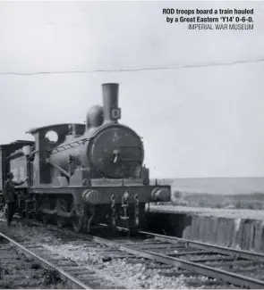  ?? IMPERIAL WAR MUSEUM RAIL ARCHIVE STEPHENSON ?? ROD troops board a train hauled by a Great Eastern ‘Y14’ 0-6-0.ROD 0-6-0PT No. 683 at an unknown location on the Western Front, circa 1918. It was one of 50 built by the Baldwin Locomotive Works in the USA which arrived in France in 1917-18. After the war it was one of 38 taken over by the Belgian State Railway, latterly as No. 58.023, and it survived until 1960.