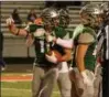  ?? PAUL DICICCO — FOR THE NEWS-HERALD ?? Danny Walsh (11) and his Lake Catholic teammates finished the regular season at 7-3.