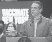  ?? SETHWENIG/AP ?? NewYork Gov. Andrew Cuomo speaks at the opening Wednesday of a mass COVID-19 vaccinatio­n site in the Queens borough of NewYork City.