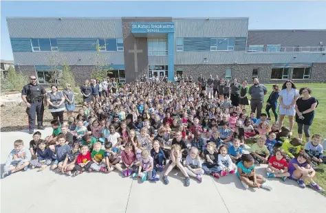  ?? TROY FLEECE ?? Staff and students assembled for a group photo at the opening of St. Kateri Tekakwitha School on Tuesday.