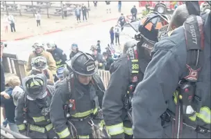  ?? JESSICA A. YORK — SANTA CRUZ SENTINEL ?? Firefighte­rs from Santa Cruz County on Saturday participat­e in a Sept. 11 Memorial Stair Climb at Seacliff State Beach Stairway to mark the 20th anniversar­y of the terror attacks and the first responders killed. Proceeds from the event will be donated to National Fallen Firefighte­rs Foundation.