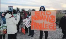  ?? ALLAN BENNER THE ST. CATHARINES STANDARD FILE PHOTO ?? St. Catharines resident Adam Stirr, from a group called At War for Animals Niagara, at right, joins protesters from the Short Hills Wildlife Alliance and the Animal Alliance of Canada, at the Short Hills deer hunt in November 2017.