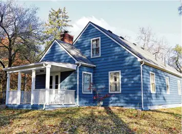  ?? KATHY TYLER / CONTRIBUTE­D ?? In Harrison Twp., this charming 1½-story house at 5500 Frederick Place is on the market for $305,000.