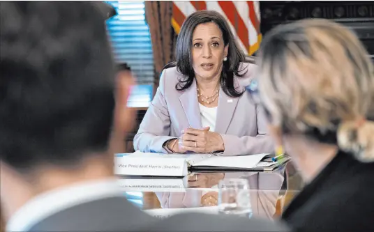  ?? Jacquelyn Martin The Associated Press ?? Vice President Kamala Harris meets with LGBTQ activists Wednesday in her ceremonial office on the White House complex. Harris is scheduled to visit the El Paso area on Friday, accompanie­d by Homeland Security Secretary Alejandro Mayorkas.