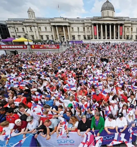  ?? ?? Some people are on the pitch: The crowd of 7,000 fans that gathered in Trafalgar Square yesterday to salute the Lionesses’ 2-1 victory over Germany on Sunday