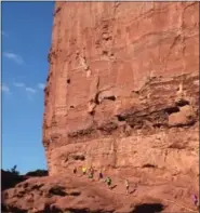  ?? COURTESY OF RUN WILD RETREAT & WELLNESS ?? The red rocks around Moab, Utah, tower over participan­ts at the Run Wild Retreat & Wellness Mindful Running Retreat.