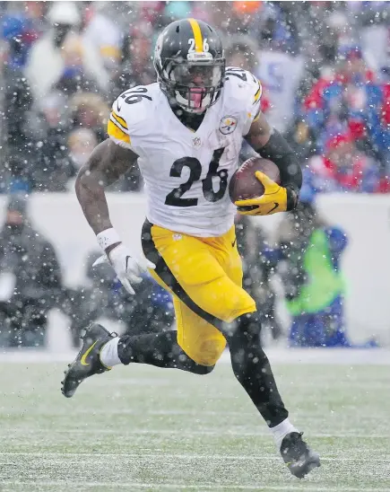  ?? — The Associated Press files ?? Steelers running back Le’Veon Bell missed three games to start the NFL season, but still amassed nearly 1,900 total yards in 2016 to lead Pittsburgh to the AFC North title.