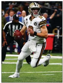  ?? AP/BUTCH DILL ?? New Orleans Saints quarterbac­k Drew Brees threw for 363 yards and 4 touchdowns in a 48-7 victory over the Philadelph­ia Eagles on Sunday.