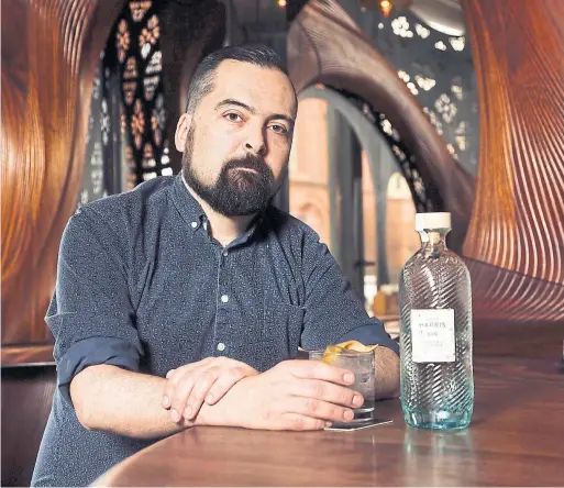  ?? ANDREW FRANCIS WALLACE/TORONTO STAR ?? Vincent Pollard, a bartender at Toronto’s Bar Raval, says that while the new distilled gin flavours on the market are endless, some are better than others.