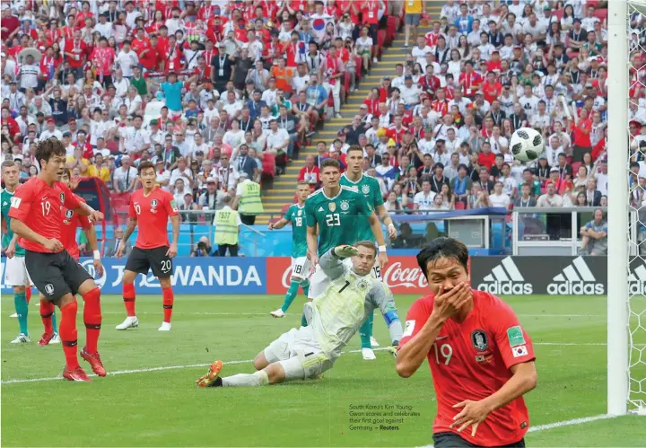  ?? — Reuters ?? South Korea’s Kim Younggwon scores and celebrates their first goal against Germany.