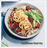  ??  ?? Cauliflowe­r fried rice