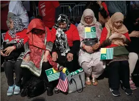  ??  ?? Demonstrat­ors pause to pray during a “Stand with Kashmir” protest outside the United Nations headquarte­rs in New York, US, on 27 September 2019. REUTERS