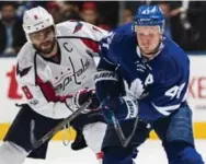  ?? MARK BLINCH/GETTY IMAGES ?? Alex Ovechkin, battling Leaf Leo Komarov, and the Capitals have lost in the first round three times since 2008. So, there’s that.