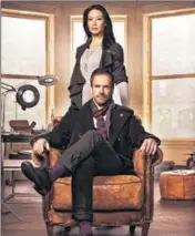  ?? GETTY IMAGES ?? Lucy Liu and Jonny Lee Miller in the serial, Elementary, set in New York. Liu plays Joan Watson.