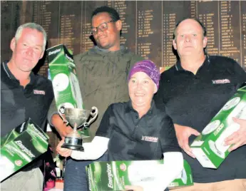  ??  ?? The winning team of the Kingdom Kings representi­ng Kingdom Builders Depot Mark Upfold, Phakema Biyela (back), Charmaine du Plessis and Rob Powell with the trophy
