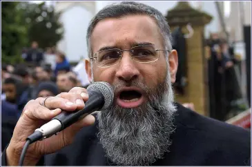  ?? Picture: HANNAH MCKAY/PA ?? POISON PREACHER: Anjem Choudary’s hate-filled speeches remain easily viewable online