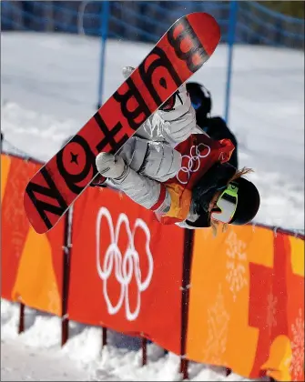  ?? ASSOCIATED PRESS ?? CHLOE KIM, OF THE UNITED STATES, JUMPS during the women’s halfpipe finals at Phoenix Snow Park at the 2018 Winter Olympics in Pyeongchan­g, South Korea, Tuesday.