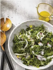  ?? JOE KELLER/AMERICA’S TEST KITCHEN ?? Herb salad makes a good side for Sunday’s one-dish meal.