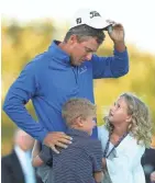  ?? GETTY IMAGES ?? Charles Howell III of the United States celebrates with his kids, Charles and Ashley, after winning for the first time in 11 years.