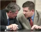  ?? ANTONIO PEREZ/POOL/CHICAGO TRIBUNE ?? Jason Van Dyke confers with defense attorney Randy Rueckert on Thursday.