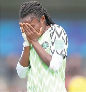  ??  ?? An emotional Joy Duru of Nigeria’s Falconets reacts after the quarter-final loss to Spain in the 2018 FIFA women’s U-20 world Cup IN France