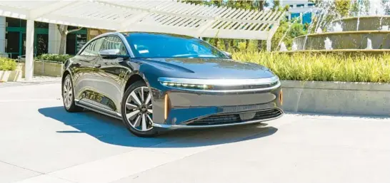  ?? REX TOKESHI-TORRES/EDMUNDS ?? The 2022 Lucid Air is a luxury electric sedan with an EPA-estimated range of up to 520 miles.