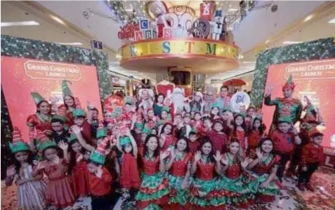  ??  ?? IT'S CHRISTMAS TIME. Little elf toy makers filled SM City Tarlac with cheers as toys were brought to life during the ceremonial lighting and ribbon-cutting of SM City Tarlac’s Christmas Toy Universe. With its interactiv­e elements and mechanized features, it truly captures the heart of not only the young generation but also, the kids at heart.