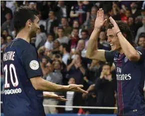  ?? EPA PIC ?? Paris Saint Germain's Edinson Cavani (right) celebrates with Javier Pastore after scoring against Guingamp on Sunday.