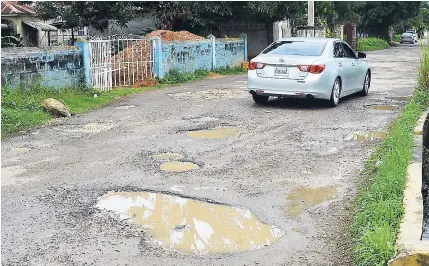  ??  ?? Potholes like these are causing havoc for residents of Dumfries.