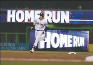  ?? The Associated Press ?? RISING ROOKIE: Miami Marlins rookie Brian Anderson runs the bases on June 11 after hitting a solo home run off of San Francisco starter Madison Bumgarner during the fourth inning of a 7-5 home win against the Giants.