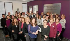  ?? SUBMITTED PHOTO — BERKSHIRE HATHAWAY ?? Staff members gather at Berkshire Hathaway’s new office in Southampto­n.