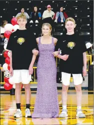  ?? ?? Sophomore maid Ava Nall, daughter of Marty and Laura Nall, escorted by Charlie Nunn (left), son of Curtis and Sarah Nunn, and Eric Henderson, son of Robert and Amy Henderson.