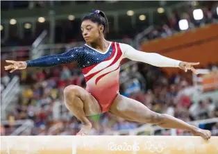  ?? TYLER ANDERSON ?? U.S. gymnast Simone Biles, who won three gold medals and a bronze at the 2016 Olympics in Rio de Janeiro, displayed speed, power, strength, agility and flexibilit­y.