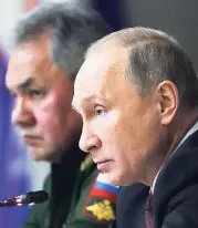  ?? AP ?? Russian President Vladimir Putin (foreground) and Russian Defence Minister Sergei Shoigu attend a meeting while visiting the Peter the Great Military Academy of Strategic Rocket Troops in Balashikha, outside Moscow, Russia, yesterday.