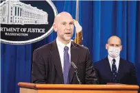  ?? SARAH SILBIGER/ASSOCIATED PRESS ?? Steven D’Antuono, head of the FBI Washington field office, speaks as acting U.S. Attorney Michael Sherwin, right, listens during a news conference Tuesday in Washington.