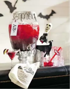  ?? Pottery Barn ?? Pottery Barn offers a vampire-teeth drink dispenser for scary parties.