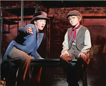  ?? PHOTO BY DIANE SOBOLEWSKI ?? Gavin Swartz, left, portrays The Artful Dodger, and Elijah Rayman is Oliver in Goodspeed’s “Oliver!”