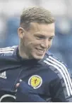 ?? ?? ↑ Lewis Ferguson is happy to be back with Scotland