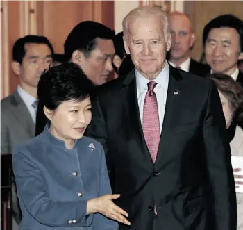  ?? AHN YOUNG-JOON/AFP/Get ty Imag es ?? South Korean President Park Geun-hye, left, escorts U.S. Vice-President Joe Biden as he arrives for a meeting in Seoul on Friday. Biden was on a weeklong trip through the region.