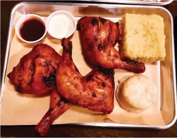  ?? PHOTOS: PETER HUM ?? The barbecue chicken legs at Moe’s BBQ were mellow, moist and crisp-skinned.