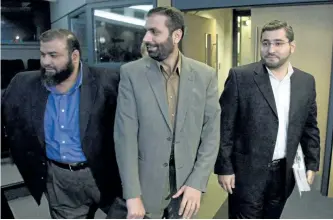  ?? ADRIAN WYLD/THE CANADIAN PRESS ?? From left: Ahmad El Maati, Muayyed Nureddin and Abdullah Almalki arrive at a news conference last week in Ottawa. The three Canadians were tortured in Syria and have received a total of $31 million in federal compensati­on.