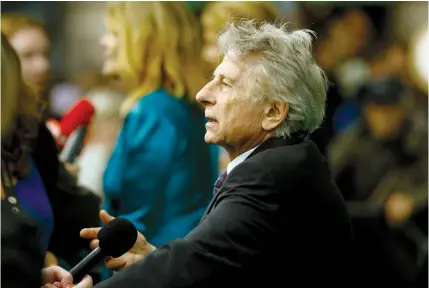  ?? (Arnd Wiegmann/Reuters) ?? DIRECTOR Roman Polanski talks to the media as he arrives to present his movie ‘D’après une histoire vraie’ at the Zurich Film Festival, last month.