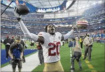  ?? AP PHOTO/MARK J. TERRILL ?? San Francisco 49ers cornerback Ambry Thomas celebrates after catching an intercepti­on in overtime against the Los Angeles Rams om Sunday in Inglewood. The 49ers came away with a come-from-behind 27-24victory.