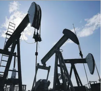  ?? LARRY McDOUGAL/THE CANADIAN PRESS/FILES ?? Alberta’s finances depend heavily on the direction of oil and natural gas prices. The second-quarter fiscal update released Tuesday is a testament to that, Chris Varcoe writes.