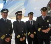  ??  ?? Capt. Evan Summerfiel­d, Cathay’s deputy chief pilot for Airbus (right) and his copilots for the ferry flight