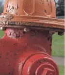  ?? GARY COSBY JR./TUSCALOOSA NEWS ?? Fire hydrants communicat­e how much water they can flow to firefighte­rs by color coding applied to their caps.