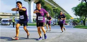  ??  ?? Happy participan­ts of the AUSMAT ICare Run.