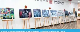  ?? ?? Canvas of photos assembled at the exhibition. — Photos by Yasser Al-Zayyat