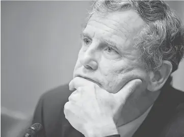  ??  ?? Senator Brown and ranking member of the Senate Banking, Housing and Urban Affairs Committee, during a Senate hearing in Washington on June 14. — WP-Bloomberg photo